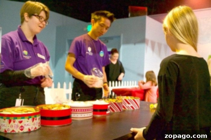 Discovery Cube OC's Winter Wonderfest 5 Decorating cookies at the hands-on gingerbread station at Discovery Cube OC