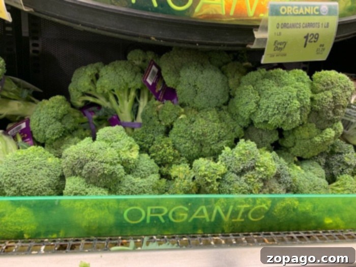 Crisp-Tender Oven Broccoli 3 Close-up of vibrant green broccoli florets, showcasing their natural texture and freshness, ideal for a delicious and healthy side dish.