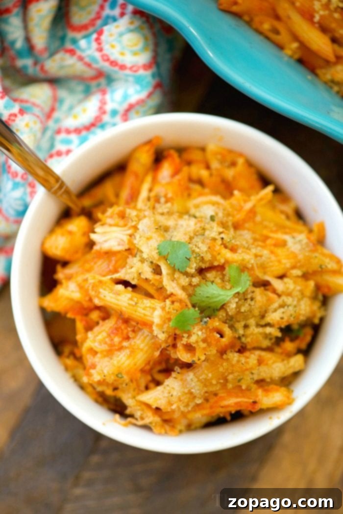 This easy chicken parmesan casserole recipe tastes great and is a great weeknight meal when you're busy! No boiling required just dump, bake, and serve! easy chicken parmesan casserole 6