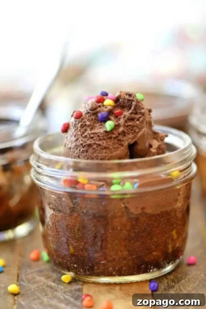 Portable Cupcake Perfection 3 Copycat Wicked Good Cupcakes in a jar, showcasing layers of chocolate cake, peanut butter, and creamy topping