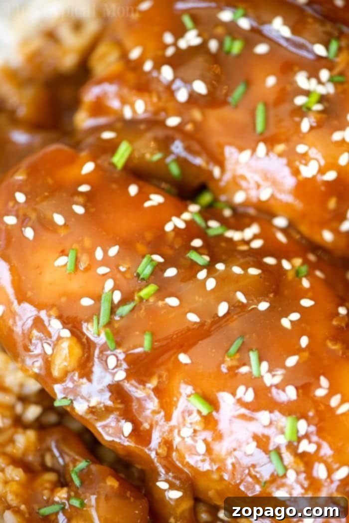 This easy crockpot sticky teriyaki chicken with a kick of heat recipe is amazing and a healthy meal too! Sweet with just a pinch of Sriracha makes it great! crockpot sticky teriyaki chicken