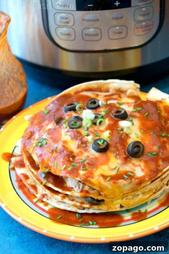 Instant Pot Mexican pizza is amazing!! With layers and layers of cheese, sauce and ground turkey it's like a wonderful enchilada lasagna! #instantpot #mexicanpizza #pizza #pressurecooker #instantpotrecipes #thetypicalmom instant pot mexican pizza