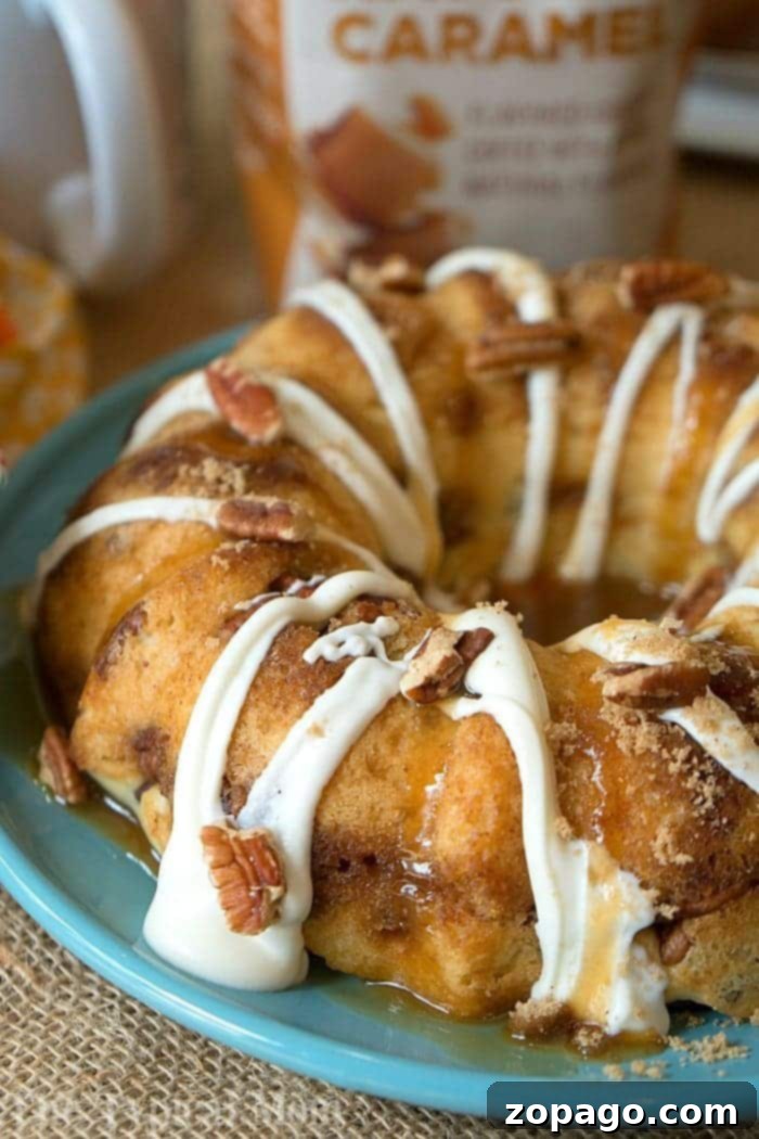 Instant Pot coffee cake is amazing! Bake it in the oven or in your pressure cooker with some coffee for the perfect breakfast. Caramel coffee cake comes out moist with all of the flavors locked in and I love it so I can bake during the summertime and not heat my house up! #coffeecake #instanntpot #pressurecooker #breakfast #instantpotrecipes #thetypicalmom #caramel #cake A slice of Ninja Foodi Coffee Cake, showcasing its moist texture