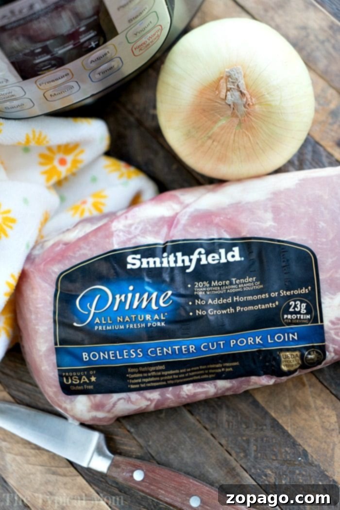 Instant Pot Hawaiian pulled pork is amazing and perfect for any party served as sliders or on top of rice for a tasty family Instant Pot dinner. Pressure Cooker Hawaiian Pulled Pork
