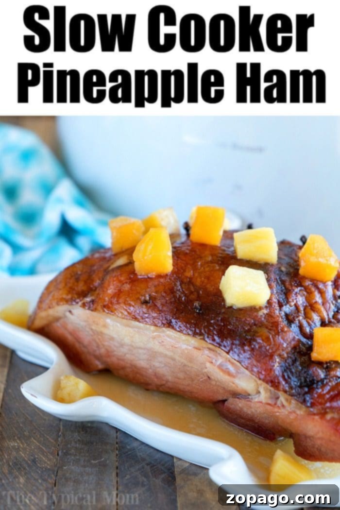 This pineapple crockpot ham recipe is sweet, tender, and delicious. Cooks on it's own in your slow cooker and is ready when you are, perfect for holidays! #crockpot #slowcooker #ham #pineapple #christmas #dinner #easter Crockpot Ham Recipe 3