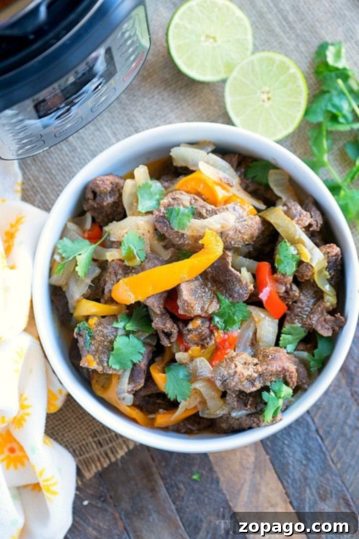 Instant Pot fajitas are great and take just minutes to cook to tender perfection. Flavorful marinated beef and vegetables are for dinner tonight! #instantpotrecipes #thetypicalmom #instantpot #fajitas #beef #lowcarb #ninjafoodirecipes #crockpotexpress Instant Pot steak Fajitas with tortillas and guacamole