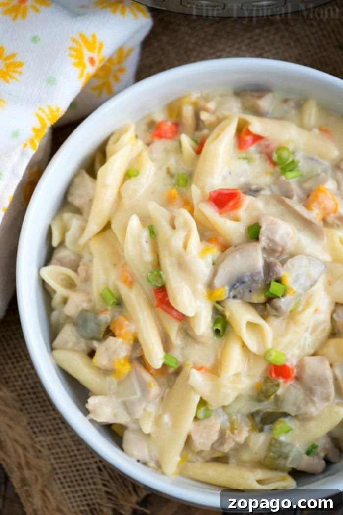 This pressure cooker lemon chicken casserole is great! Using chicken thighs, mushrooms, and pasta you too can make this hearty meal for your family tonight. #instantpotrecipes #pressurecooker #casserole #lemonchicken #pasta #thetypicalmom #instantpotrecipeseasy Pressure Cooker Lemon Chicken Casserole