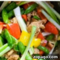 Instant Pot Stir-Fry Blitz 2 A vibrant instant pot stir fry featuring snap peas, bell peppers, juicy chicken, and fresh green onions.