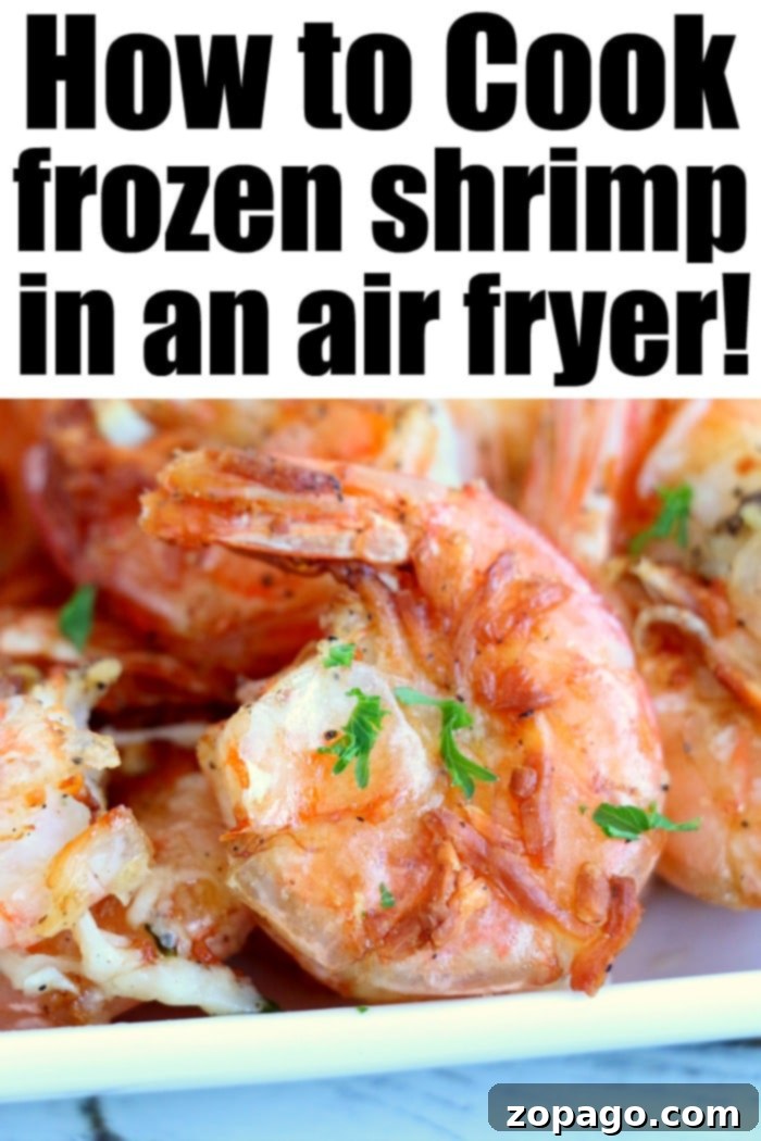Crispy Air-Fried Fish Ideas 8 Frozen shrimp being cooked directly in an air fryer basket, a quick and easy seafood meal