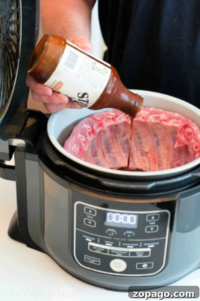 Perfect Ninja Foodi Ribs 4 Tender, flavorful pork ribs cooked in a Ninja Foodi, coated in a savory barbecue glaze
