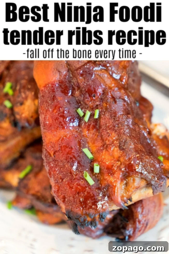 Enjoy perfectly cooked Ninja Foodi ribs: incredibly tender with a rich barbecue glaze, ready for a fantastic meal. A plate of perfectly glazed and tender Ninja Foodi ribs, showcasing the fall-off-the-bone texture.