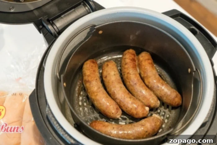 Ninja Foodi brats. Crispy air fryer brats in the Ninja Foodi basket