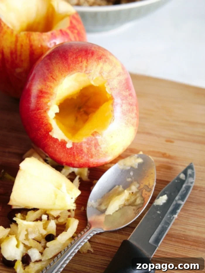 Stuffed baked apples in a pressure cooker. #instantpot #pressurecooker ninja foodi baked apples being stuffed