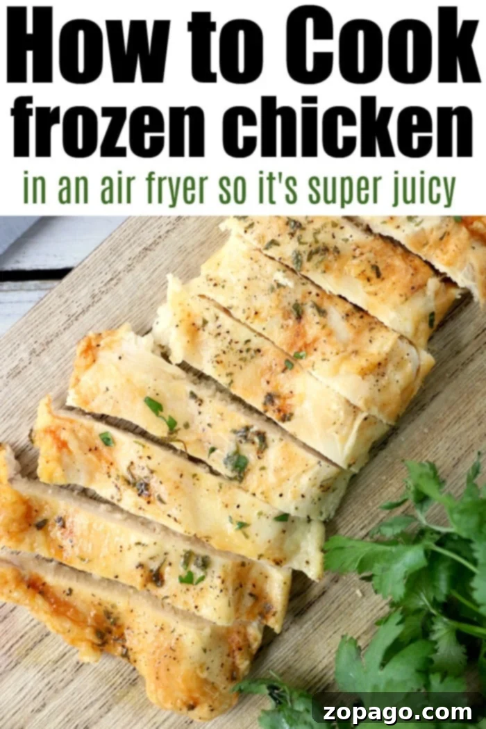 How to cook frozen chicken breast in air fryer for a quick and easy meal. Close up of air fryer frozen chicken breast, showing a perfectly browned exterior.