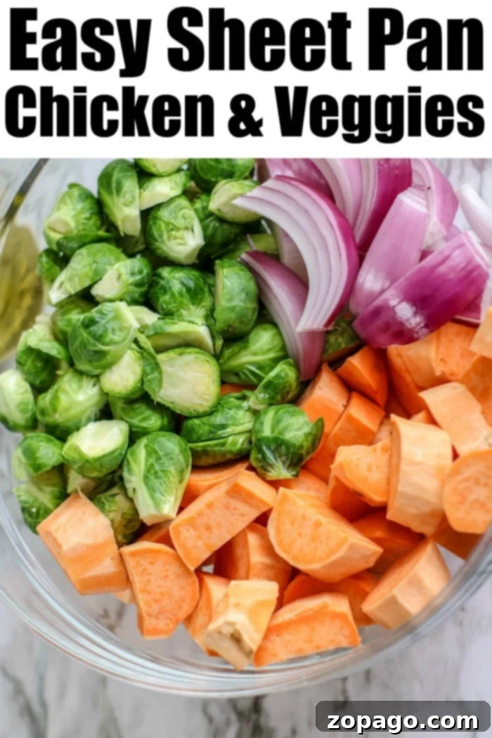 Best sheet pan chicken thighs and vegetables are so easy to throw together, bake, and enjoy with your family. A healthy meal with tons of flavor for the win. #chickenthighs #chickenrecipes #sheetpanrecipes #sheetpanchicken sheet pan chicken and veggies, a delicious and easy one-pan meal for dinner