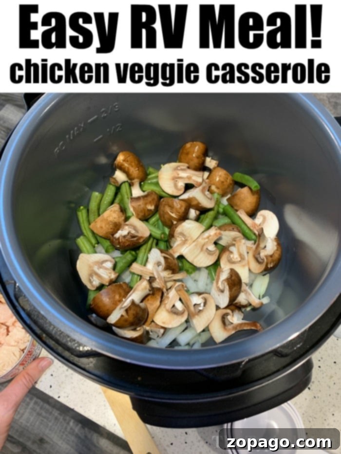 Best Chicken Mushroom Casserole: A hearty and healthy meal featuring tender chicken, fresh mushrooms, and vibrant green beans, easily made in an Instant Pot or Ninja Foodi. Delicious RV meal: Instant Pot Chicken Mushroom Rice Casserole, packed with fresh green beans and tender chicken for a healthy and quick dinner.