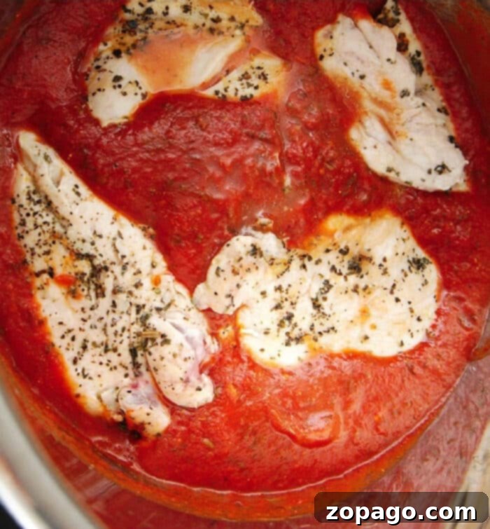 Easy Instant Pot Chicken Parmesan 2 Instant Pot Chicken Parmesan with fresh chicken breasts, no breading