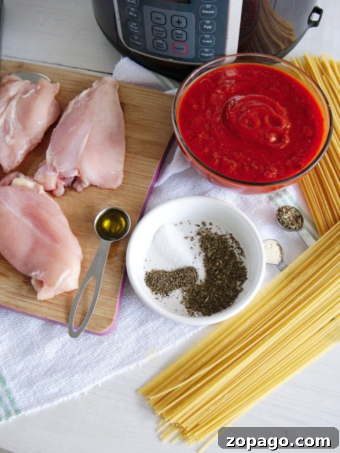 Pressure cooker chicken parmesan with chicken breasts is amazing! Tender meat smothered in flavorful tomato sauce and mozzarella cheese. Dinner is here! #instantpot #instantpotrecipes #instantpotchickenparmesan #chickenparmesan #chicken #instantpotchicken #thetypicalmom chicken parmesan instant pot no breading