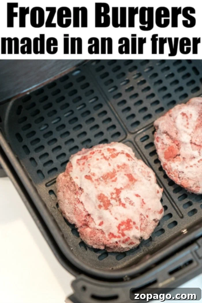 How long to cook frozen hamburger in an air fryer so it's juicy! If you forgot to defrost ground beef for dinner, don't fret we've got you covered here. #airfryerrecipes #airfryerhamburgers #frozenhamburgers #airfryer #thetypicalmom frozen hamburgers ready to cook