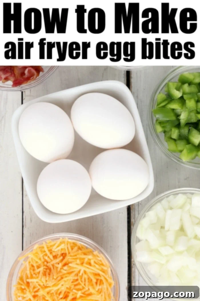 Delicious air fryer egg bites with bacon, cheese, and onions – a perfect low carb and keto breakfast idea, much like customized Starbucks egg bites! Closeup of perfectly cooked air fryer egg bites in silicone cups
