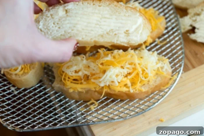 Air Fryer Grilled Cheese Perfection 4 Delicious grilled cheese sandwich with golden brown bread, perfectly toasted and ready to be served.