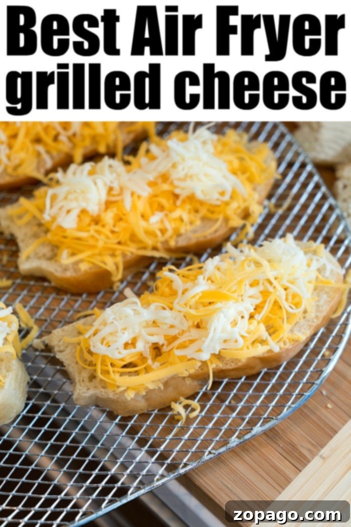 Air Fryer Grilled Cheese Perfection 9 A stack of golden air fryer grilled cheese sandwiches on a plate, with one sliced to show the gooey melted cheese inside. Perfect for any meal or snack.