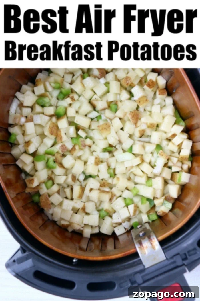 Best Air fryer breakfast potatoes with bell peppers topped with cheese are great with eggs, or make breakfast for dinner some night! Cheap and full of flavor. air fryer potatoes