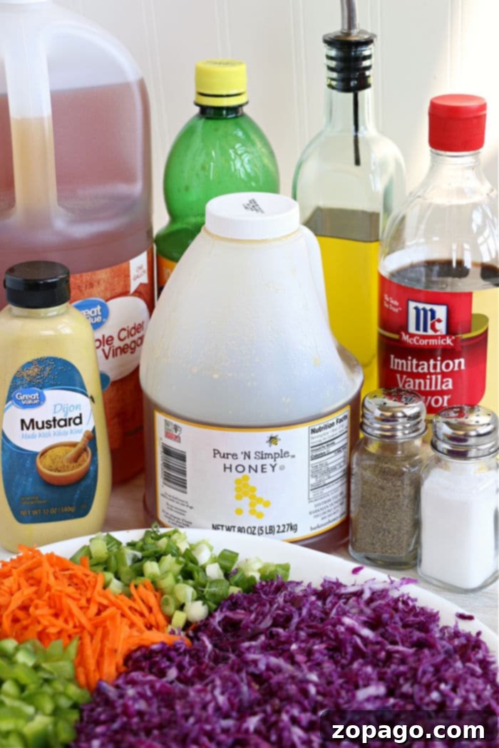 Vibrant Red Cabbage Slaw 3 Close-up of red cabbage coleslaw recipe showing finely shredded red cabbage, carrots, and green onions mixed with dressing.