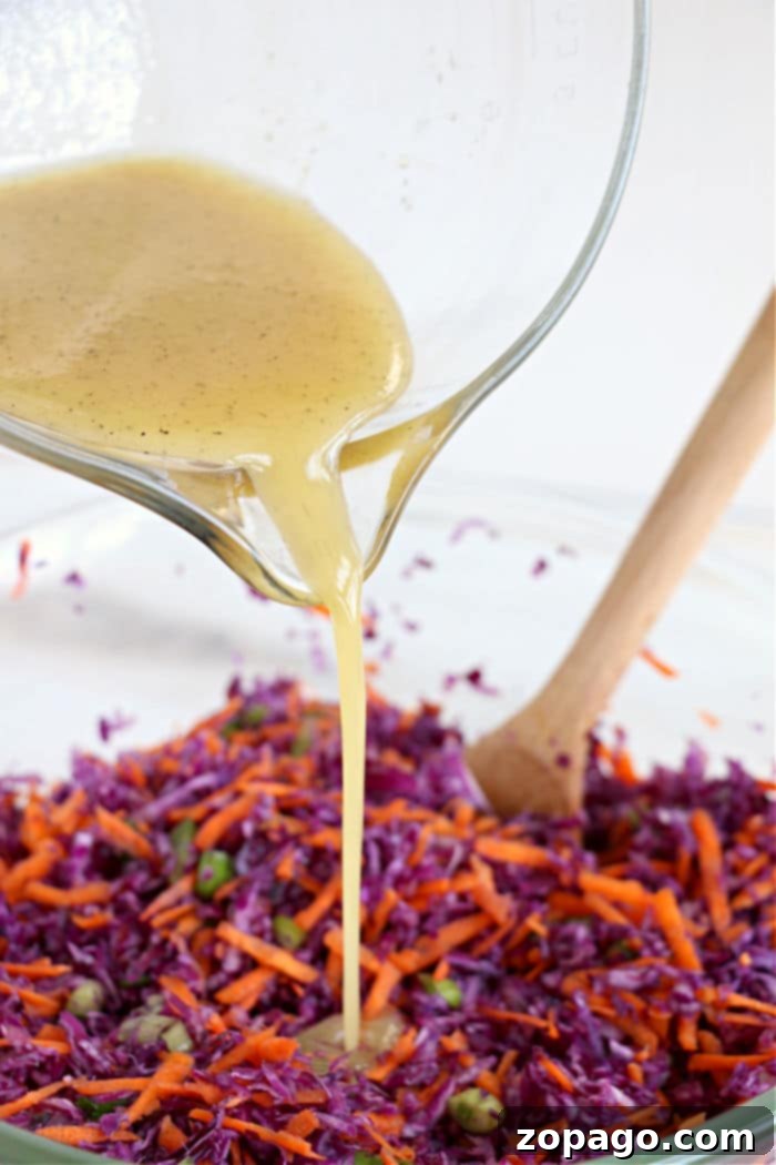 Vibrant Red Cabbage Slaw 5 A bowl of freshly made red cabbage coleslaw ready to be served, highlighting its vibrant colors and crisp texture.