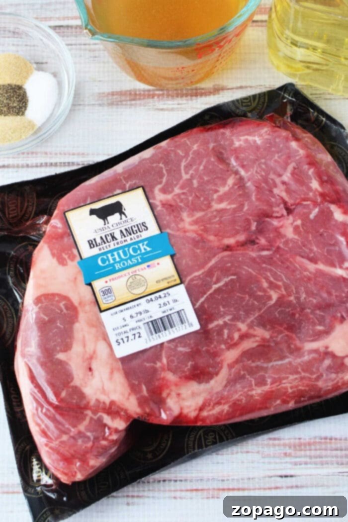 Melt-in-Your-Mouth Mississippi Pot Roast 3 Packaged Black Angus chuck roast on a table with broth, oil, and seasoning bowls nearby—perfect for making savory Mississippi roast in your slow cooker.