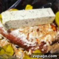 Melt-in-Your-Mouth Mississippi Pot Roast 8 A seasoned Mississippi roast in the slow cooker is topped with a block of herb butter and sliced green peppers for an indulgent dish.