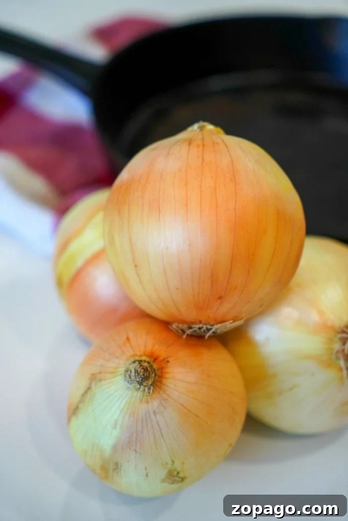 Sweet Golden Caramelized Onions 3 fresh yellow onions waiting to be sliced