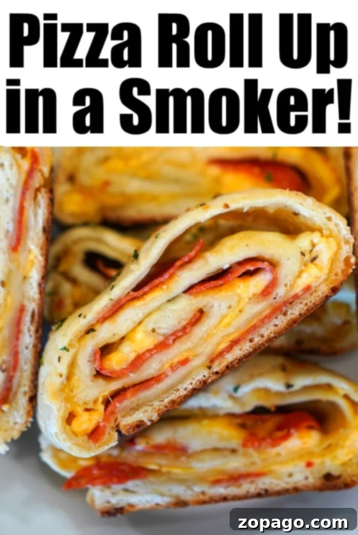 Pizza Swirls 10 Close-up of a perfectly cooked Traeger pizza roll-up, golden brown and enticing.