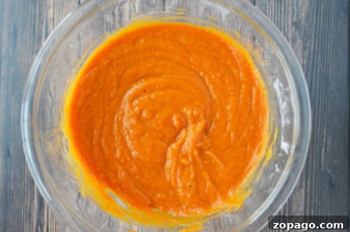 Scratch-Made Pumpkin Crisp 4 Fresh pumpkin puree, a key ingredient for the delicious and creamy pumpkin crisp filling.