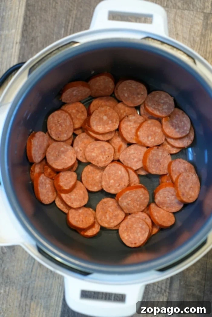 Sweet and Savory Instant Pot Mountain Dew Stew 6 Sliced smoked sausage (kielbasa or andouille) ready for the Instant Pot stew