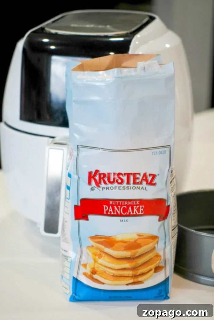 Air Fryer Pancake Perfection 4 Pancake batter being poured into a springform pan for air frying