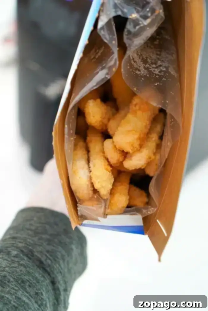 Crispy Air Fryer Fish and Chips 5 A close-up of crispy fish fillets and golden fries, showcasing the deliciousness of air fryer fish and chips.