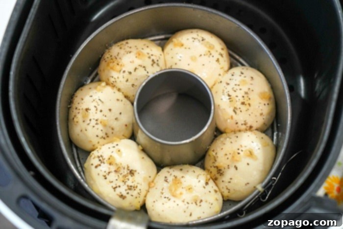 Crispy Air Fryer Frozen Rolls 6 Freshly baked air fryer rolls, golden and inviting, ready to be served.
