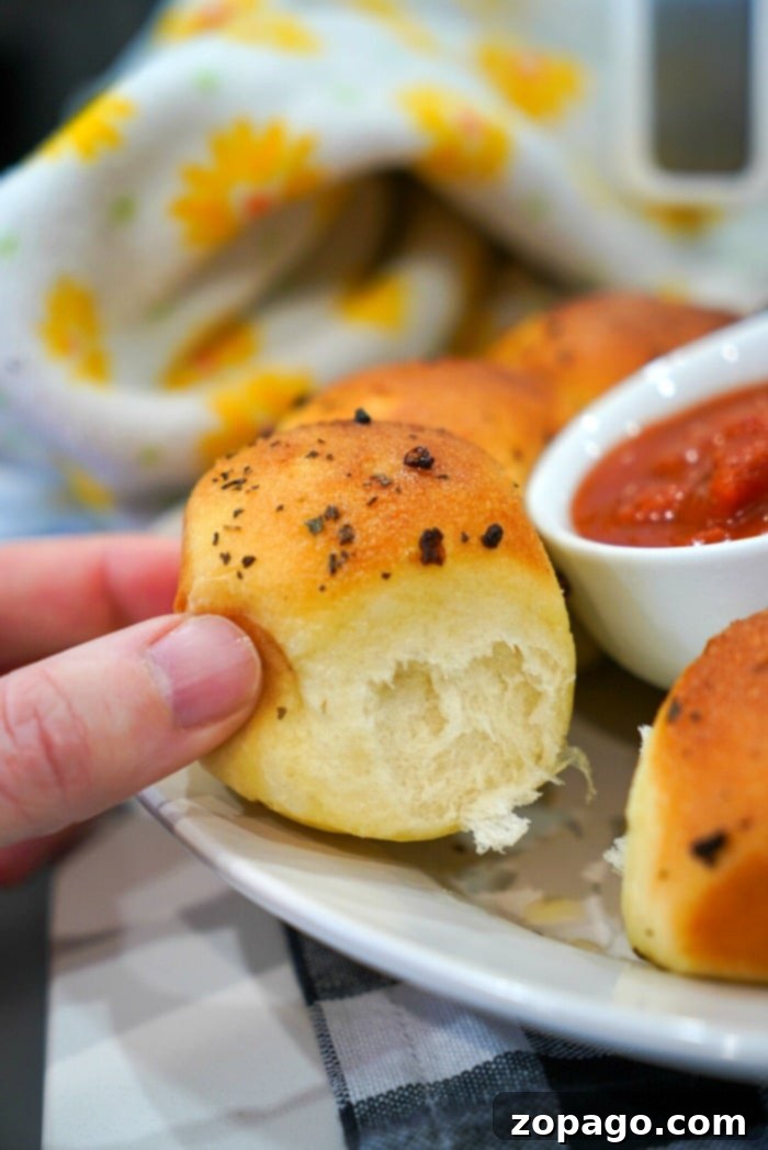 Crispy Air Fryer Frozen Rolls 9 A display of various baked goods made with Rhodes rolls, showcasing their versatility.