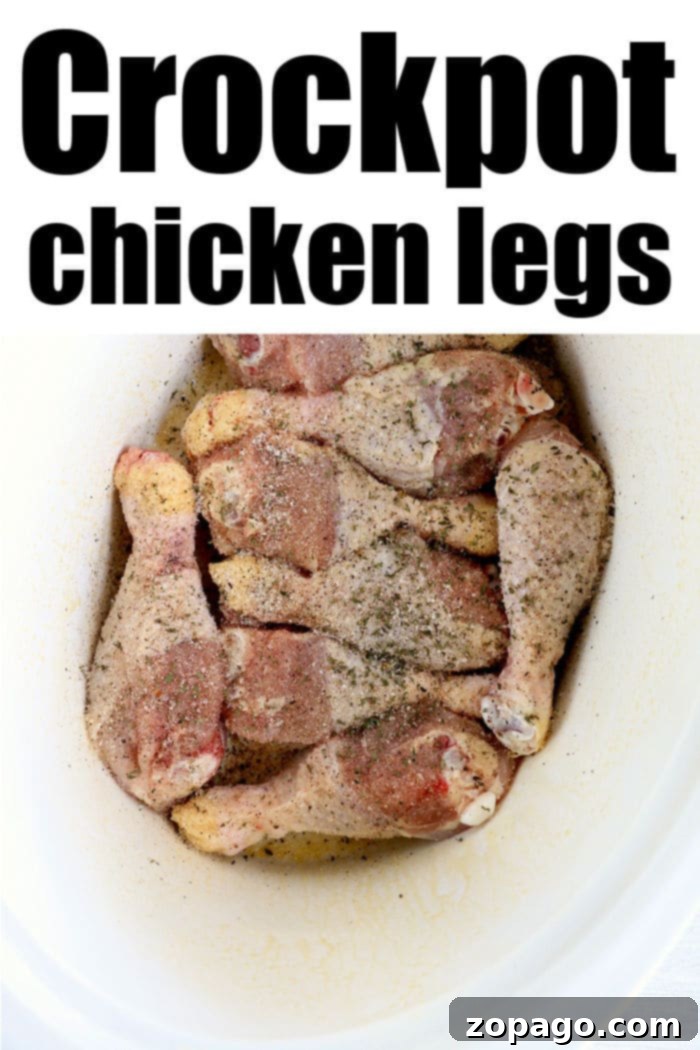 Fall-Off-The-Bone Slow Cooker Chicken Legs 5 Crockpot BBQ chicken legs glazed with a savory sauce, ready for a delicious meal.