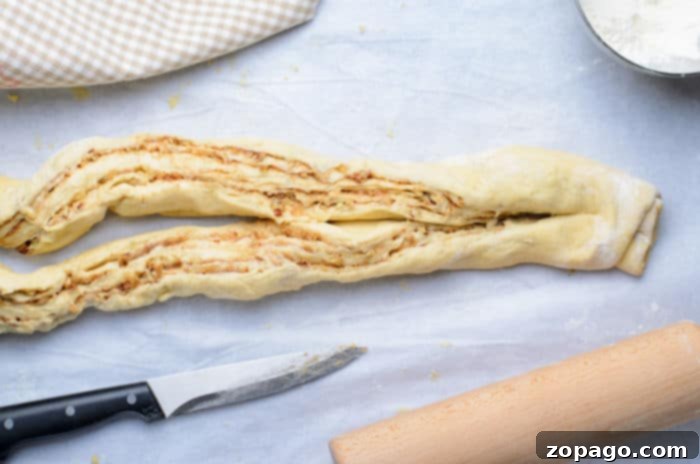 The Art of Braided Bread 7 Cinnamon wreath bread before baking, showcasing the intricate braid.
