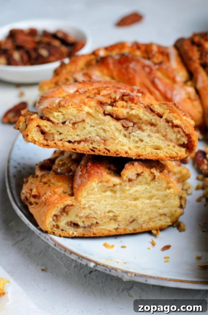 The Art of Braided Bread 10 Sliced homemade wreath bread recipe with a glaze.