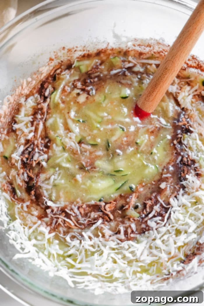 Tropical Zucchini Coconut Loaf 4 Expert tips for achieving the best moist zucchini bread recipe, showing shredded zucchini ready for baking