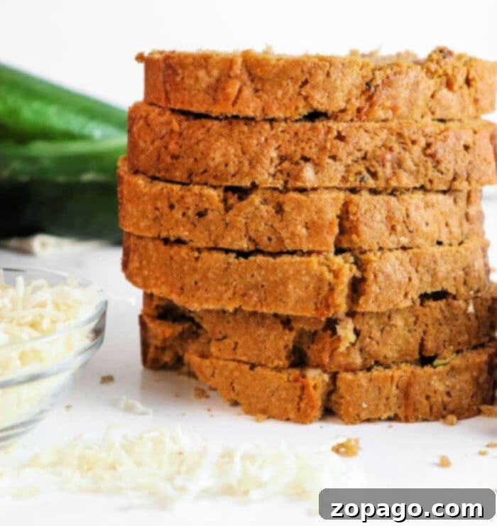 Tropical Zucchini Coconut Loaf 8 Close-up of baked Coconut and Zucchini Bread slices, revealing the moist crumb and shredded coconut