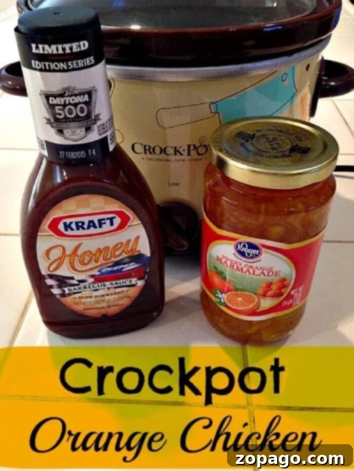 Crockpot orange chicken recipe that cooks on its own in your slow cooker. Healthy and easy slow cooker recipe, even kids love this one! #crockpot #orangechicken #chicken #slowcooker #crockpotrecipes #thetypicalmom 3 Ingredient Crockpot Orange Chicken