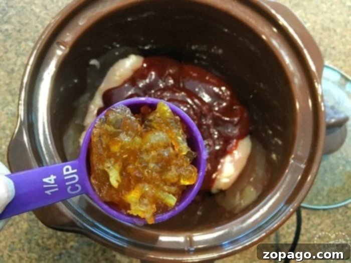 Easy crockpot orange chicken recipe to make that cooks on its own in your crockpot. Healthy slow cooker recipe that is easy to make, even my kids love this one! #crockpot #orangechicken #chicken #slowcooker easy orange chicken recipe.