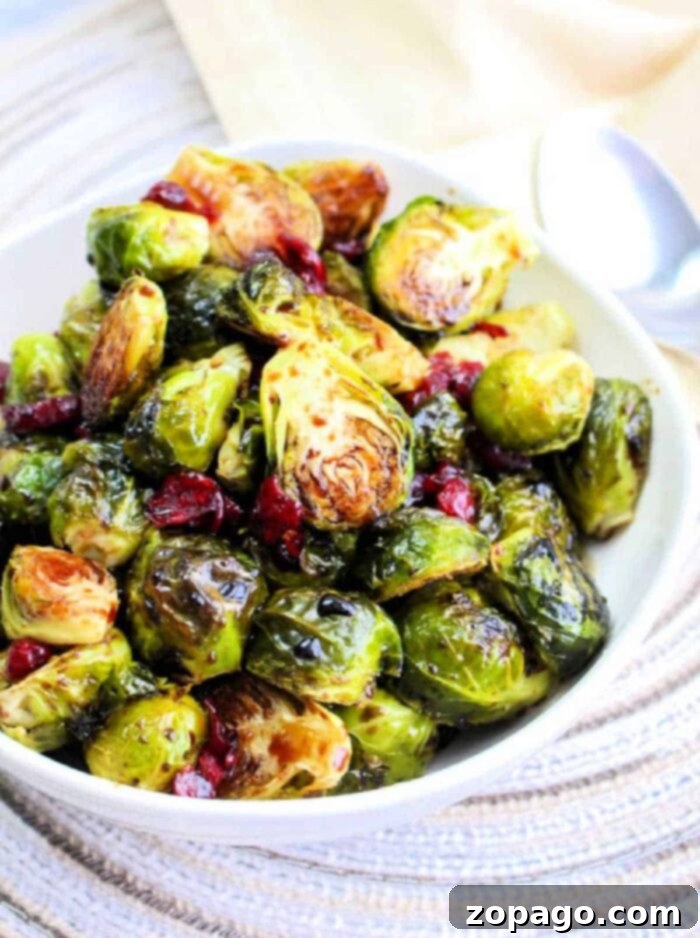 Crispy Brussels with Sweet Balsamic Drizzle 8 A baking sheet filled with perfectly roasted Brussels sprouts at 375 degrees, showing golden-brown edges.