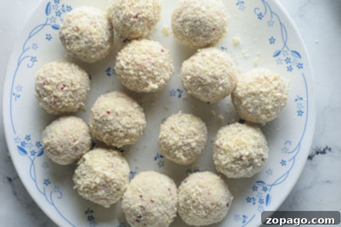 Crispy Air-Fried Mashed Potato Bites 6 Baked golden mashed potato balls on a plate