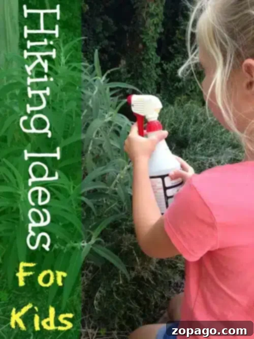 Fun Hikes for Little Explorers 2 Smiling child enjoying a hike with a spray bottle, a fun hiking idea for kids