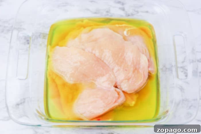 Unlock the Secret McChicken Recipe 4 Perfectly breaded fried chicken breast ready for cooking